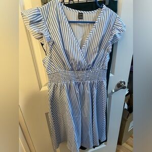 Light blue striped mini dress Size L never worn